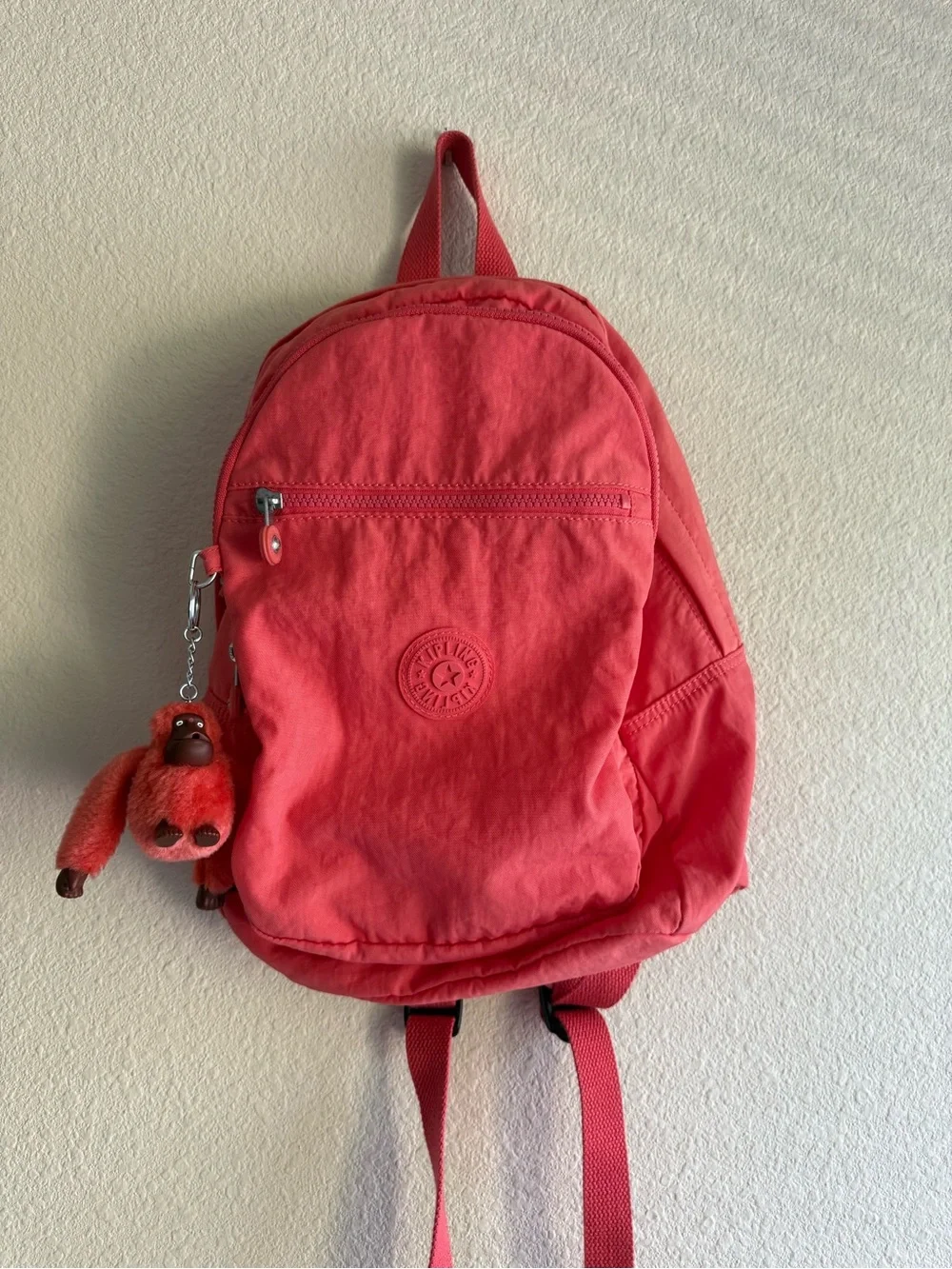 Kipling Coral Pink Mini Backpack with Monkey Charm